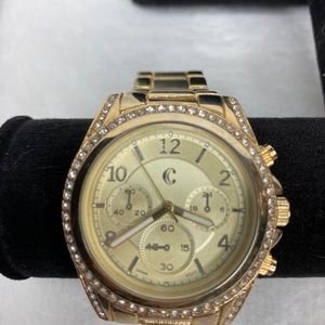 Charming Charlie’s gold and crystal watch